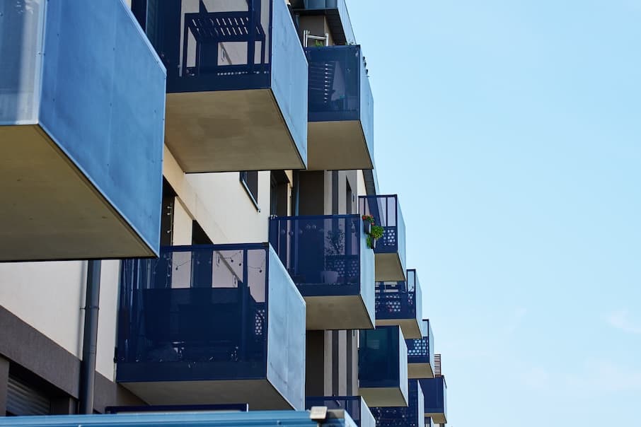 New smart apartment building facade with balconies.